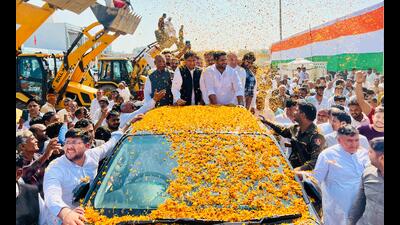 Rohtak MP Deepender Hooda during a roadshow at Narnaund in Hansi district, on Sunday. (HT Photo) Rohtak MP Deepender Hooda during a roadshow at Narnaund in Hansi district, on Sunday. (HT Photo)