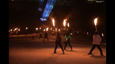 Skiers hold flaming torches on Sunday night on the eve of the sixth edition of the Khelo India Winter Games in Gulmarg on Sunday. J&K lieutenant governor Manoj Sinha inaugurated a laser and torch show on the occasion (. Waseem Andrabi/HT) Skiers hold flaming torches on Sunday night on the eve of the sixth edition of the Khelo India Winter Games in Gulmarg on Sunday. J&K lieutenant governor Manoj Sinha inaugurated a laser and torch show on the occasion (. Waseem Andrabi/HT)