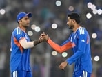 India's Axar Patel and captain Suryakumar Yadav. 