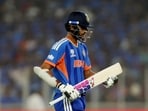 Washington Sundar walks back to the pavilion after losing his wicket, caught out by South Africa's Quinton de Kock off the bowling of Corbin Bosch