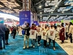 Indian Youth Congress (IYC) workers stage a 'shirtless protest', walking around holding T-shirts with slogans against the government and the India-US trade deal printed on them, at the AI Impact Summit.