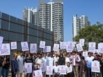 Protesters said the proposed C&D collection site in Sector 103 is barely 50 metres from a play school and abuts high-density residential societies and Daulatabad village. (Parveen Kumar/HT Photo)