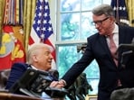 Former Britain's ambassador to the United States, Peter Mandelson, shakes hands with Donald Trump.