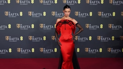 Another red ensemble, and this one was a knockout thanks to the impeccable styling choices. Maura Higgins wore a vibrant red mermaid-silhouette gown with her hair tied up in a bun.&nbsp; (REUTERS)