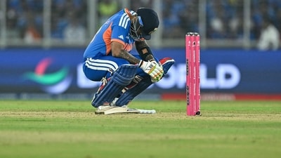India's captain Suryakumar Yadav reacts after being hit by the ball during the 2026 T20 World Cup Super Eights match against South Africa on February 22 (AFP)