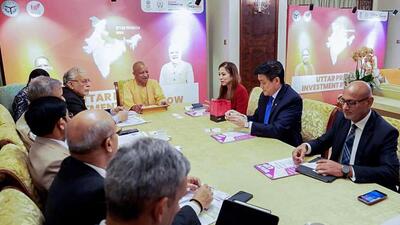 Uttar Pradesh chief minister Yogi Adityanath at a meeting in Singapore on Monday. (ANI)