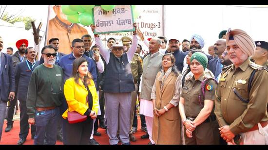 Governor Gulab Chand Kataria participating in an anti-drug march in Mukerian on Monday. (Harpreet Kaur/HT Photo)