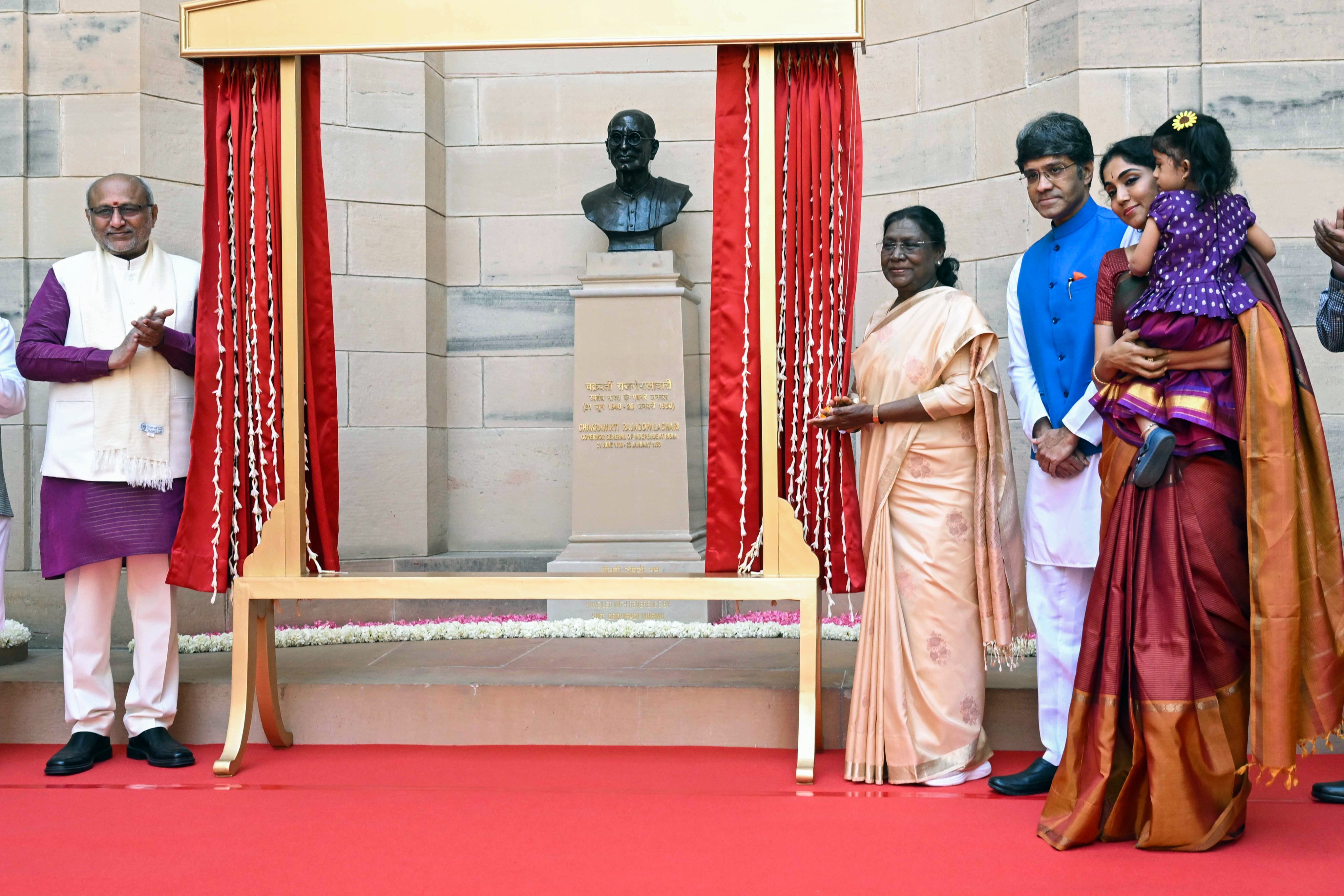 President Droupadi Murmu during the unveiling of the bust of Chakravarti Rajagopalachari at Rashtrapati Bhavan on Monday, Feb 23. Vice President CP Radhakrishnan and C Rajagopalachari's family members were also present. (Photo: X/@rashtrapatibhvn) President Droupadi Murmu during the unveiling of the bust of Chakravarti Rajagopalachari at Rashtrapati Bhavan on Monday, Feb 23. Vice President CP Radhakrishnan and C Rajagopalachari's family members were also present. (Photo: X/@rashtrapatibhvn)