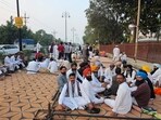 A group of farmers began their three-day mahapadav (grand protest) outside chief minister Nayab Singh Saini’s residence in Kurukshetra on Monday, demanding a rollback of the “anti-farmer” trade deal with the US and a CBI probe into the multi-crore paddy scam in the state. (HT Photo) A group of farmers began their three-day mahapadav (grand protest) outside chief minister Nayab Singh Saini’s residence in Kurukshetra on Monday, demanding a rollback of the “anti-farmer” trade deal with the US and a CBI probe into the multi-crore paddy scam in the state. (HT Photo)
