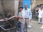 Around 100 kg of gulab jamun was found in an unhygienic condition, allegedly contaminated and exposed to flies, during an inspection at a sweet shop in Sector 62, Noida, officials said, adding that a sample was collected for laboratory testing while the rest was destroyed. (HT Photos)