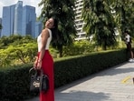 A woman recalled feeling unnoticed and independent in Singapore, contrasting it with constant social commentary back home.