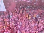 Laddoo Holi at Radha Rani Temple in Barsana town of Mathura on Tuesday . (HT PHOTO)