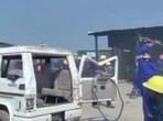 Protesting contract workers damaging a vehicle at the Panipat Refinery and Petrochemical Complex on Monday.