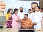 Senior BJP leader Shrinath Bhimale (sitting) took charge as PMC standing committee chairman on Monday in the presence of mayor Manjusha Nagpure (second from left). (HT PHOTO)