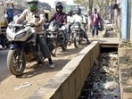 The drain runs parallel to the GT Road near the Thakurdwara flyover. (Sakib Ali/HT Photo)