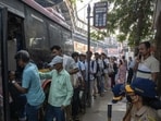 iMumbai, India - December 30, 2025: Commuters standing in a queue for a BEST bus at the spot where a BEST bus accident occurred last night at Bhadup station in Mumbai, India, on Tuesday, December 30, 2025. (Photo by Satish Bate/ Hindustan Times) (Hindustan Times)