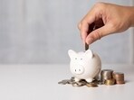 An FD locks funds for a selected term with a known rate. This structure can support discipline