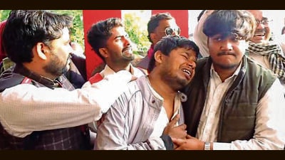 Family members mourn at a hospital in Chatra, Tuesday (PTI) Family members mourn at a hospital in Chatra, Tuesday (PTI)