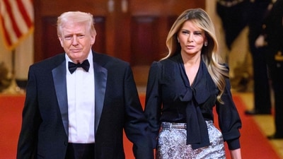 Donald Trump and Melania Trump attend a dinner with state governors in the East Room of the White House. (AFP) Donald Trump and Melania Trump attend a dinner with state governors in the East Room of the White House. (AFP)