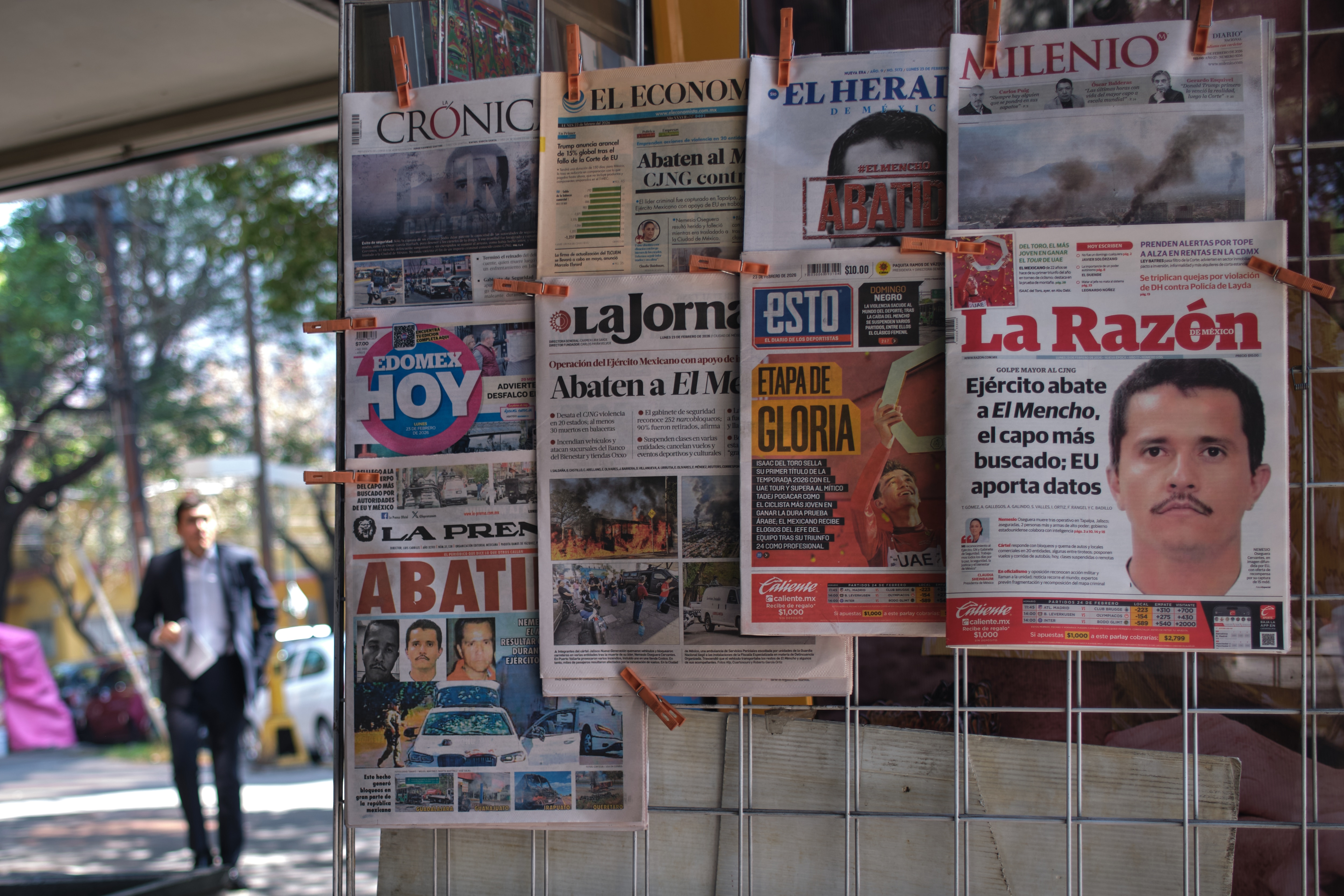 Newspapers hang on display for sale in Mexico City, Monday, Feb 23, a day after the Mexican army killed Jalisco New Generation Cartel leader Nemesio Oseguera, known as "El Mencho." (AP) Newspapers hang on display for sale in Mexico City, Monday, Feb 23, a day after the Mexican army killed Jalisco New Generation Cartel leader Nemesio Oseguera, known as "El Mencho." (AP)