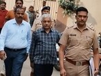 At least 50 individuals, including Charegaonkar (C) and Narendra Bhoite, son of late Phaltan MLA Krishnachandra Bhoite, have been booked in the case. (HT)