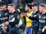 New Zealand's Rachin Ravindra (L) and wicketkeeper Tim Seifert (2L) celebrate their team's win. (AFP)
