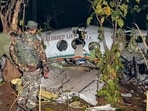 Security officials inspect the wreckage of a Redbird Airways Pvt Ltd Beechcraft C90 air ambulance that crashed near Simaria, in Chatra district, Jharkhand, Security officials inspect the wreckage of a Redbird Airways Pvt Ltd Beechcraft C90 air ambulance that crashed near Simaria, in Chatra district, Jharkhand,
