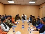 Panipat deputy commissioner Virender Dahiya chairs a meeting with officials at the refinery on Tuesday.