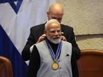 Prime Minister Narendra Modi is conferred with 'Speaker of the Knesset Medal' on Wednesday.