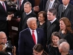 President Donald Trump walks by Supreme Court Justices as he arrives on the House floor to give his State of the Union address President Donald Trump walks by Supreme Court Justices as he arrives on the House floor to give his State of the Union address