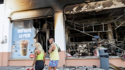 A burnt store in Jalisco. By Tuesday, Tapalpa, usually bustling with weekend visitors, was eerily quiet as tourists fled the town. (REUTERS)