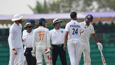 Field umpires intervene during an argument between Paras Dogra and Karnataka's Prasidh Krishna. (PTI) Field umpires intervene during an argument between Paras Dogra and Karnataka's Prasidh Krishna. (PTI)