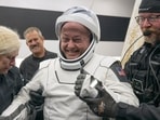NASA astronaut Mike Fincke is helped out of the SpaceX Crew-11 capsule.
