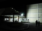 People approach the entrance of the Provincial Clinical–Surgical Hospital "Arnaldo Milian Castro," where, according to local information, injured people were being treated after an armed incident involving a Florida-registered speedboat and a Cuban patrol, at a time of heightened tensions with the United State.