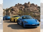 Driving a Porsche 718 Cayman GTS on the roads of Hampi is a fabulous experience.