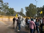 The employees had already halted departmental work on Wednesday and locked the gates of Shiksha Bhawan in Mohali before marching towards Chandigarh. (HT Photo)