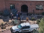 TUCSON, ARIZONA - FEBRUARY 25: In an aerial view, law enforcement officials visit Nancy Guthrie's residence on February 25, 2026 in Tucson, Arizona. (Photo by JOE RAEDLE / GETTY IMAGES NORTH AMERICA / Getty Images via AFP)