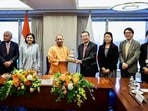 Uttar Pradesh chief minister Yogi Adityanath with Japan external trade organization chairman and CEO Norihiko Ishiguro and others during a meeting on the sidelines of Uttar Pradesh Investment Roadshow, in Japan on Wednesday. (ANI)