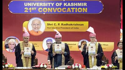 Vice President CP Radhakrishna with Jammu and Kashmir lieutenant governor Manoj Sinha, and chief minister and pro-chancellor of the University of Kashmir Omar Abdullah during the 21st Convocation of the university, in Srinagar on Thursday. (ANI) Vice President CP Radhakrishna with Jammu and Kashmir lieutenant governor Manoj Sinha, and chief minister and pro-chancellor of the University of Kashmir Omar Abdullah during the 21st Convocation of the university, in Srinagar on Thursday. (ANI)