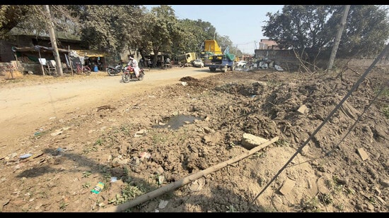 A dairy complex roads in Humbran area filled with cow dung in Ludhiana on Thursday, February 26, 2026. (Gurpreet Singh)