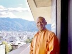 Uttar Pradesh chief minister Yogi Adityanath with a part of Mount Fuji in the background. (ANI)