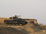 A Pakistani army tank stands at the Pakistan-Afghanistan border in Chaman on February 27, following overnight cross-border fighting between the two countries.