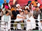 All India Congress Committee (AICC) president Mallikarjun Kharge with party leader Rahul Gandhi at a political rally in Barnala on Saturday. (Keshav Singh/HT)