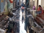 Floodwaters from the Buddha Nullah inundated Dhoka Mohalla following torrential rain on September 1 last year. (HT File) Floodwaters from the Buddha Nullah inundated Dhoka Mohalla following torrential rain on September 1 last year. (HT File)