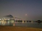 Smoke rises over a hotel damaged in Dubai's famed Palm Jumeirah, in Dubai, United Arab Emirates.