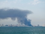 Smoke rises after reported Iranian missile attacks, following strikes by the United States and Israel against Iran, in Manama, Bahrain.