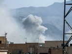 File: A plume of smoke rises following a reported explosion in Tehran on February 28, 2026. (Photo by AFP)