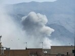A plume of smoke rises following a reported explosion in Tehran on February 28, 2026. Iran said on February 28 it will "respond decisively" after Israel and the United States launched strikes on the country despite talks underway on Tehran's nuclear programme.