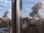 Smoke rising from a complex in Iran after Israel's strike. 