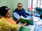 Officials during hearings under the Special Intensive Revision of electoral rolls at a centre in Kolkata.